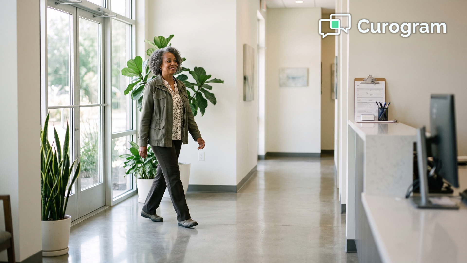 Patient walking into a bright clinic entrance with intake already completed before arrival