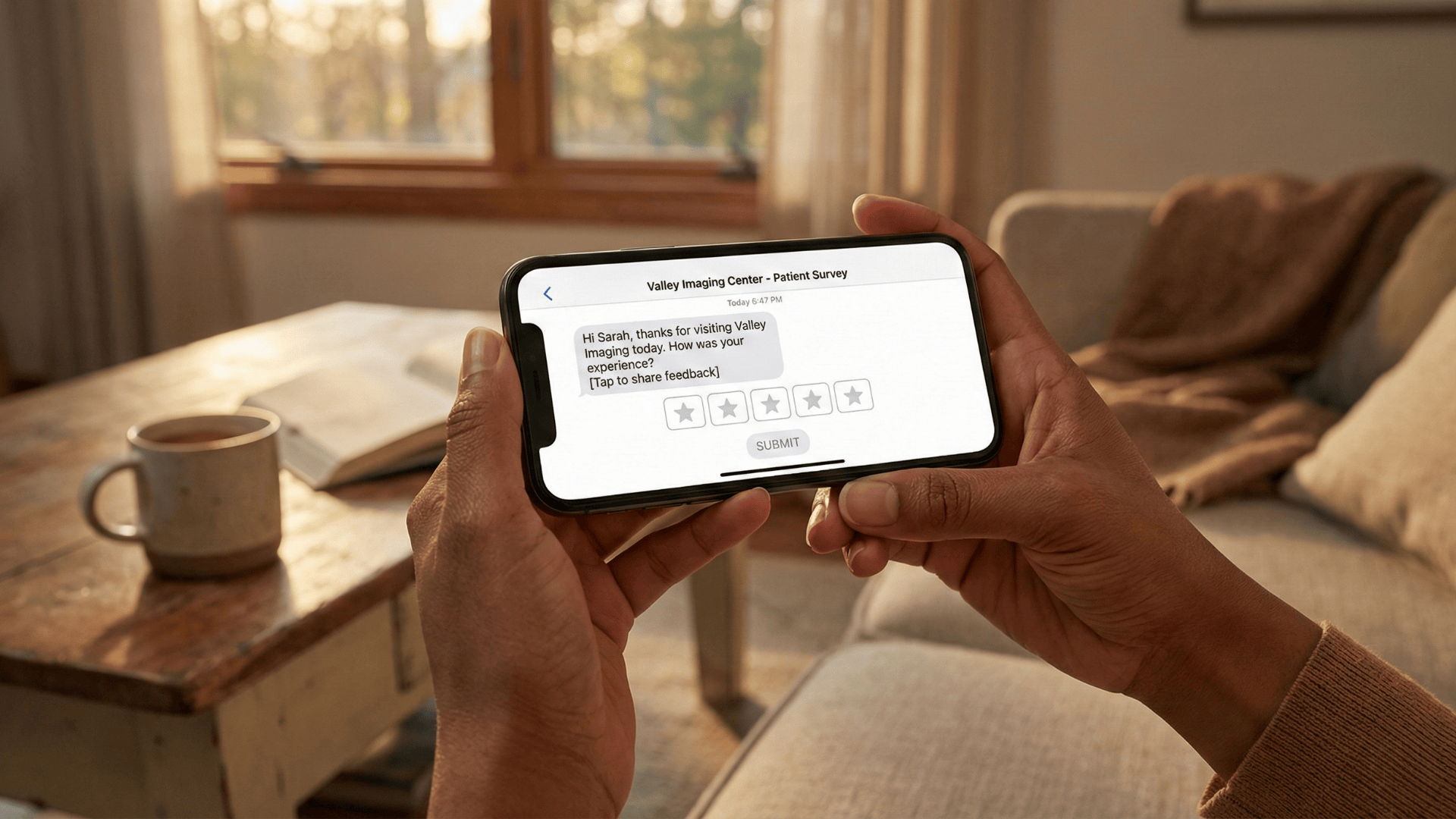 Patient receiving satisfaction survey text message after imaging appointment
