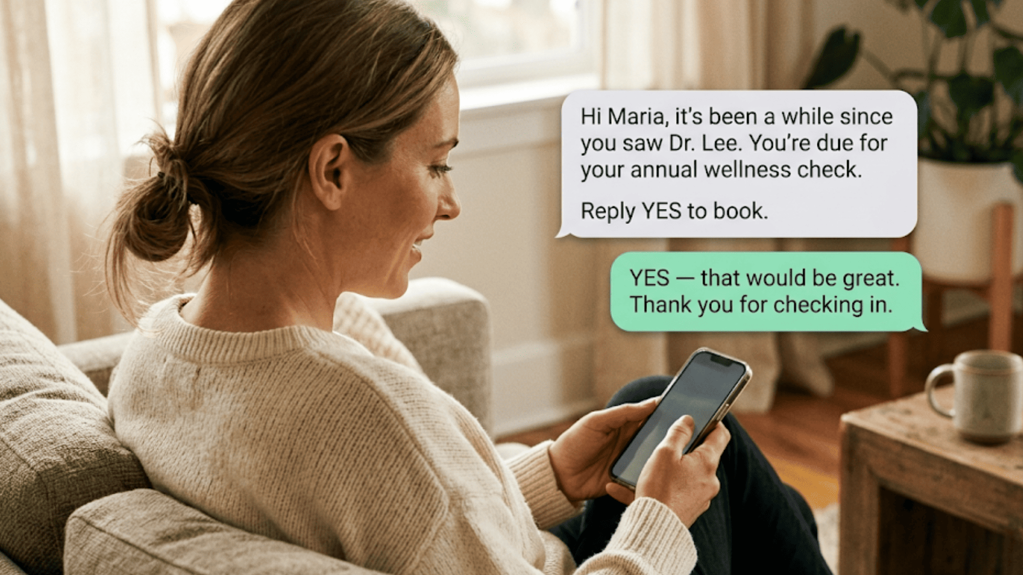 Woman reading a recall SMS from her doctor and replying YES to book an appointment