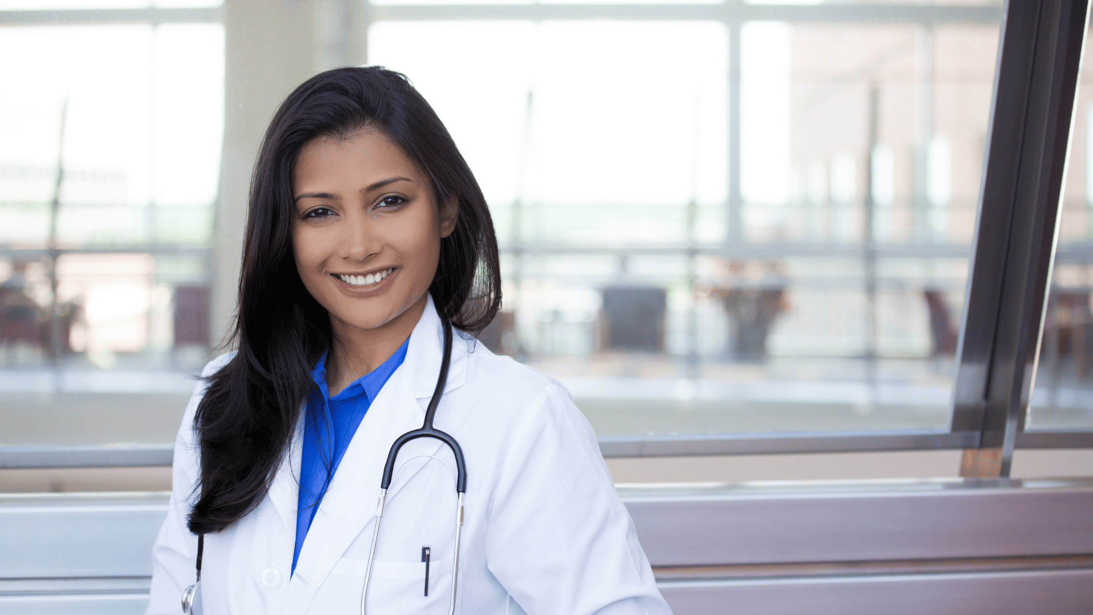Female physician with stethoscope