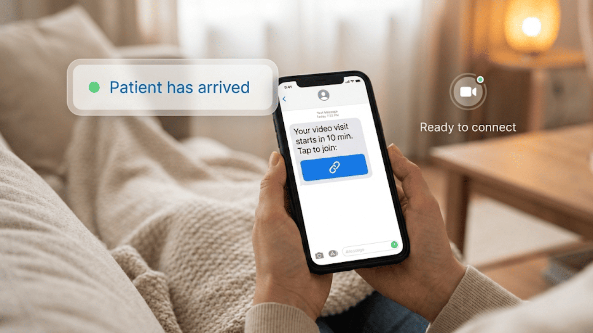 Hands holding phone with SMS reminder and patient arrived notification for video consultation