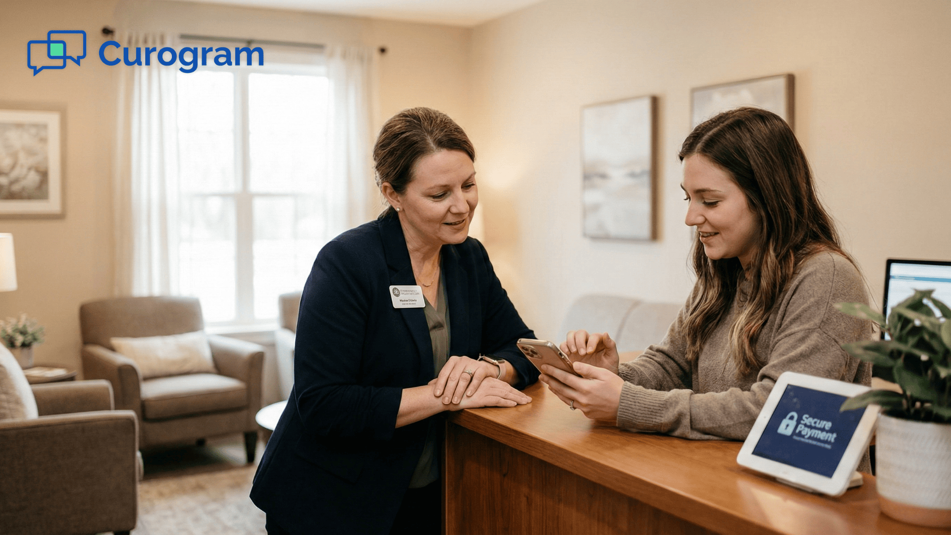 Clinic staff assisting client using phone for secure text-to-pay