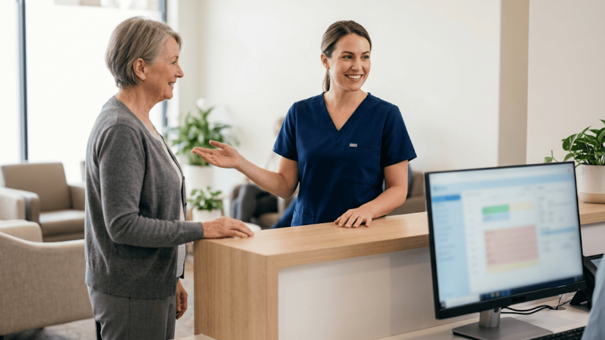 Front desk staff welcoming a new patient