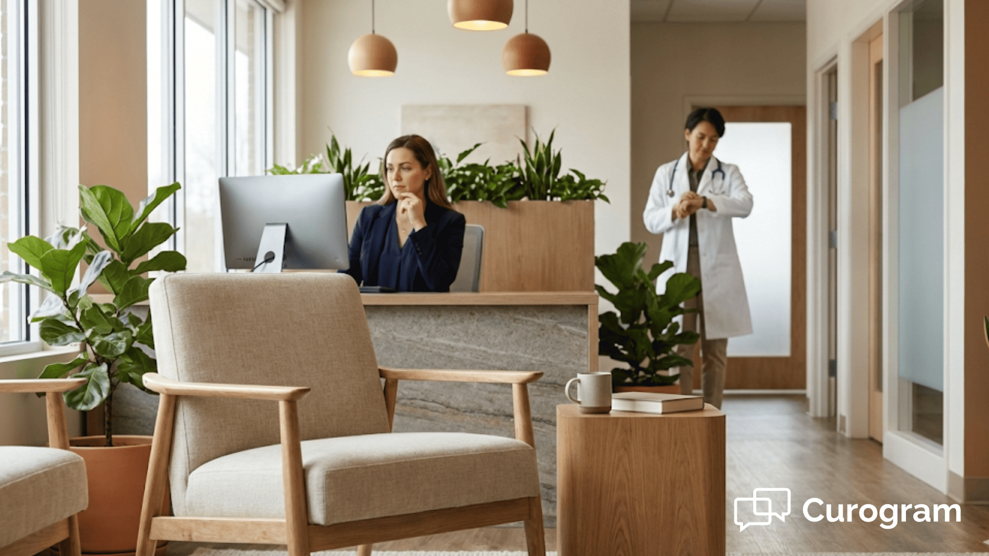Professional healthcare waiting area with natural light showing empty seat while clinic staff member reviews the schedule on screen