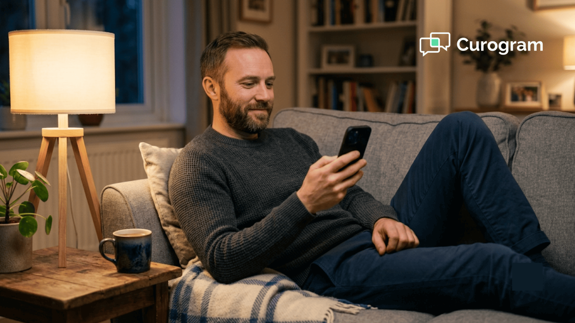 Person on a couch completing pre-visit intake on a phone instead of a waiting-room clipboard