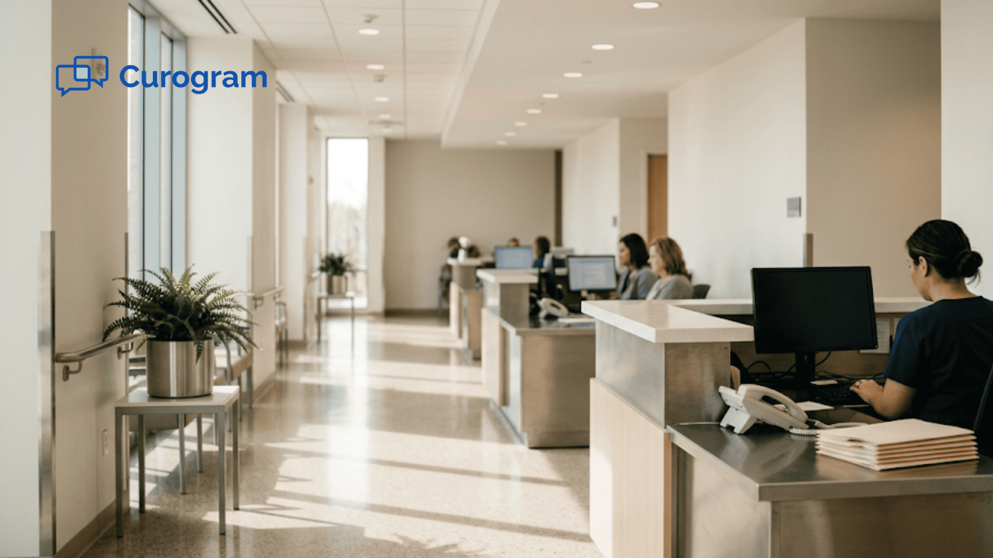 Front desk in a modern medical practice hallway, representing multi-location patient communication workflows