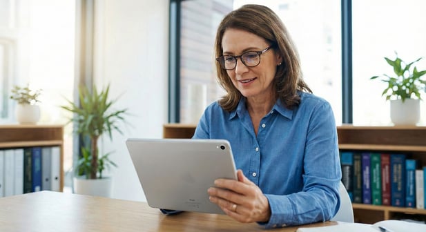 Professional doctor managing a medical clinic's digital presence on a tablet