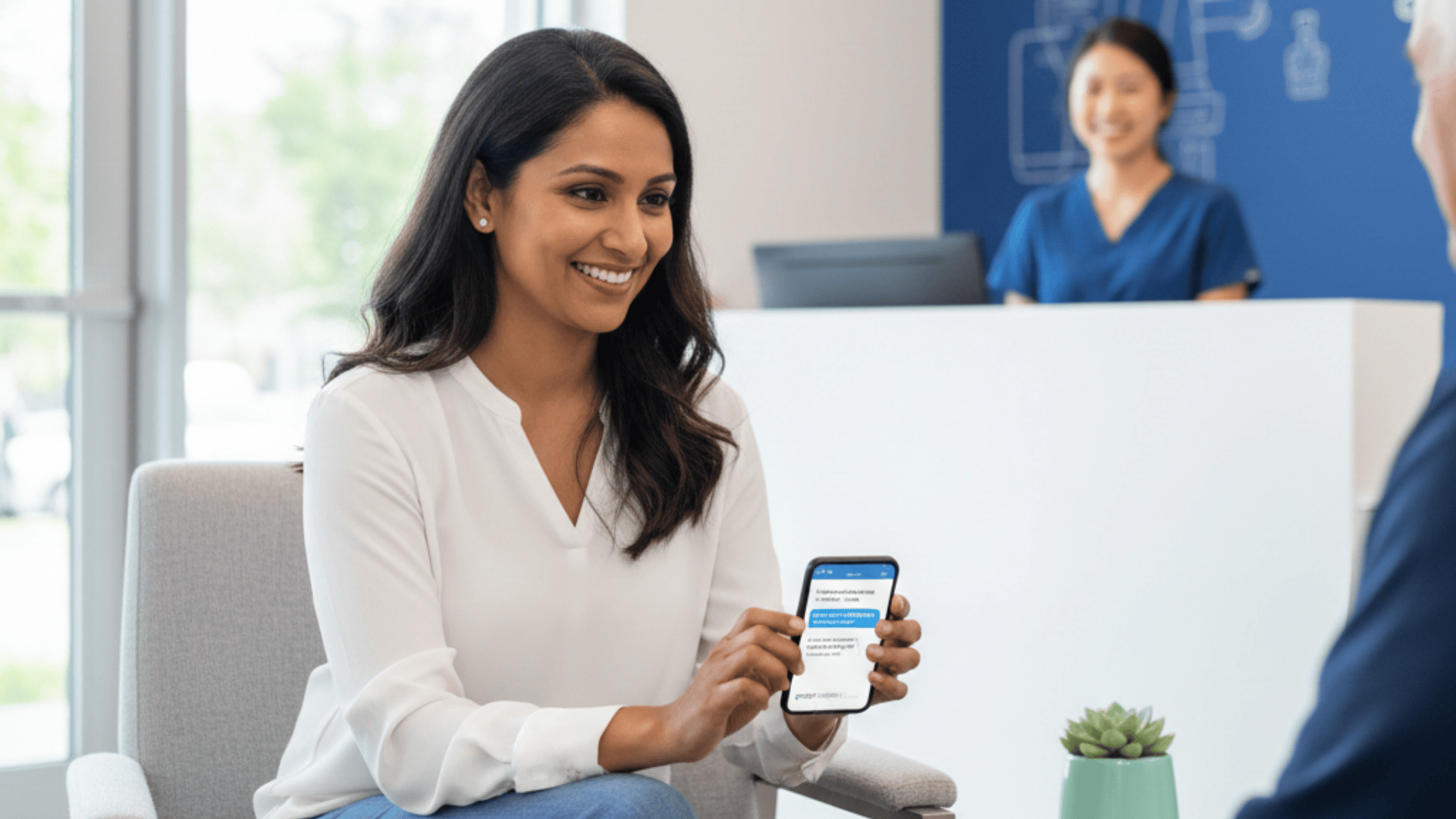 Patient reading SMS review request on phone in a medical practice waiting area