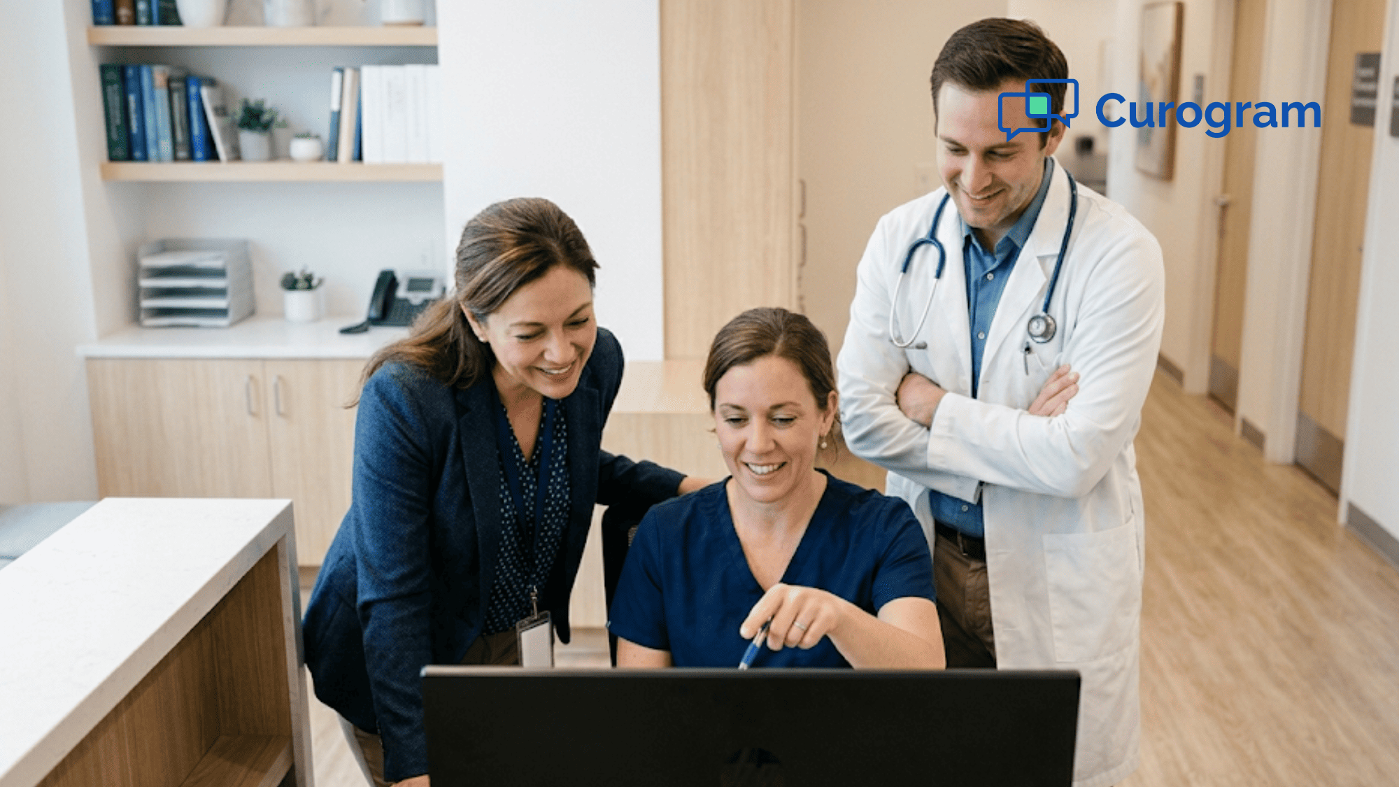 Medical practice team reviewing HIPAA compliant messaging results on computer screen