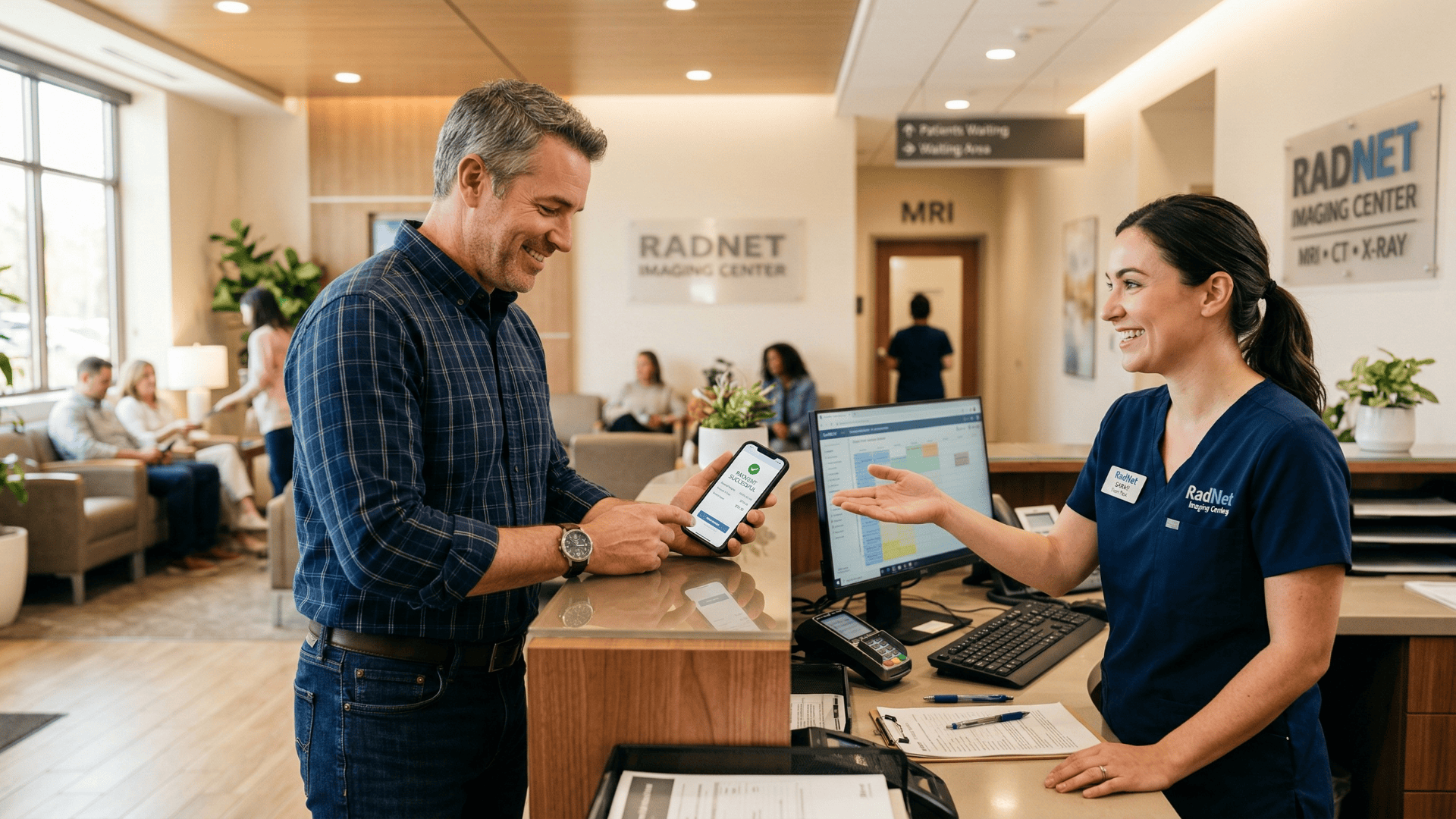 Patient completing text-to-pay copay at imaging center front desk