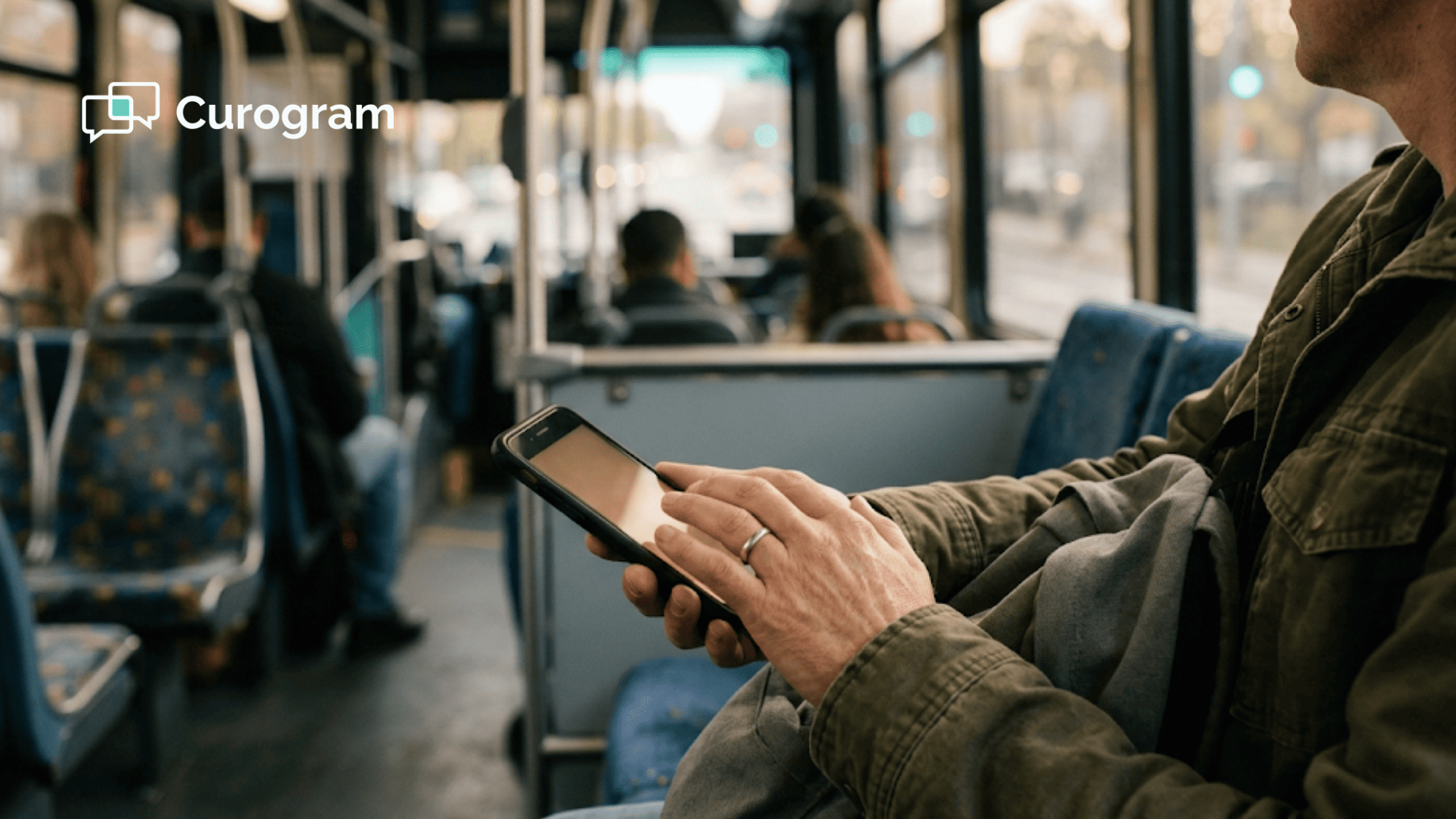 Person holding a smartphone on commute