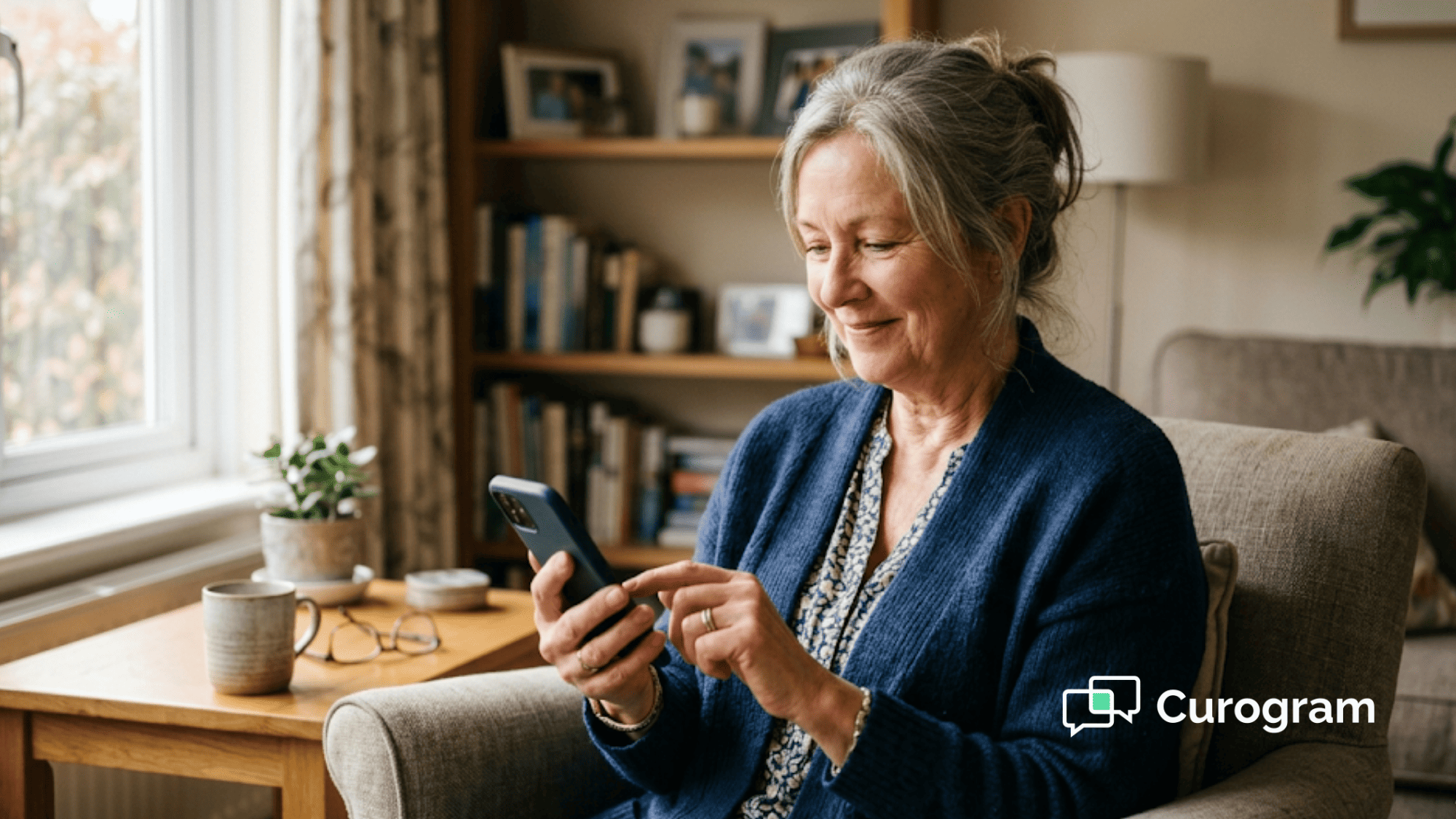 Patient comfortably texting back an appointment reminder from a couch at home