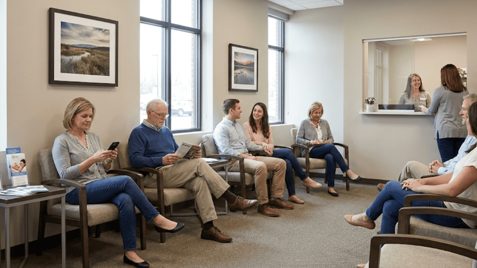 Full waiting room at a modern medical practice showing patients who confirmed their appointments