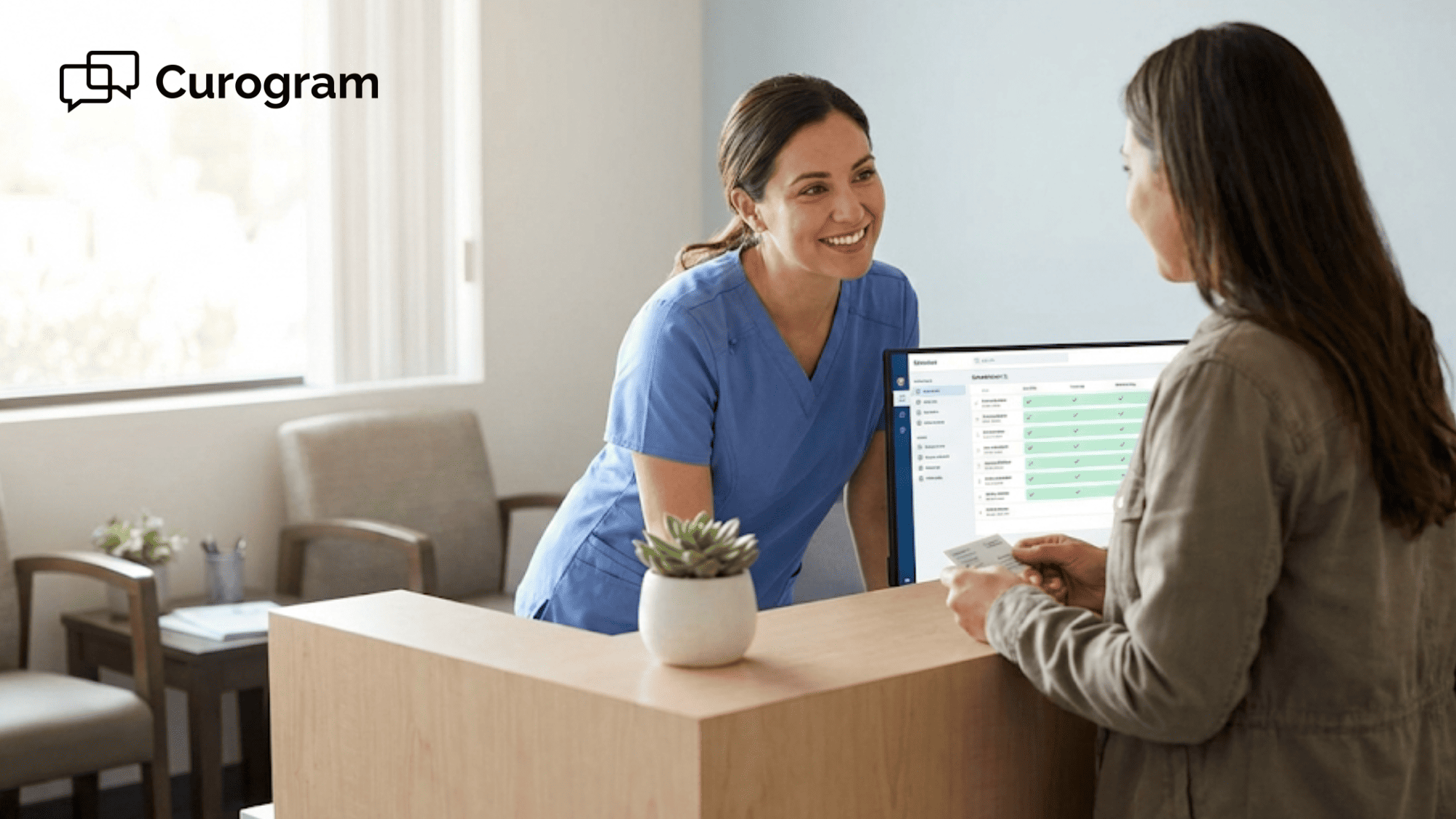 Front desk staff member helping patient at a modern medical office reception area