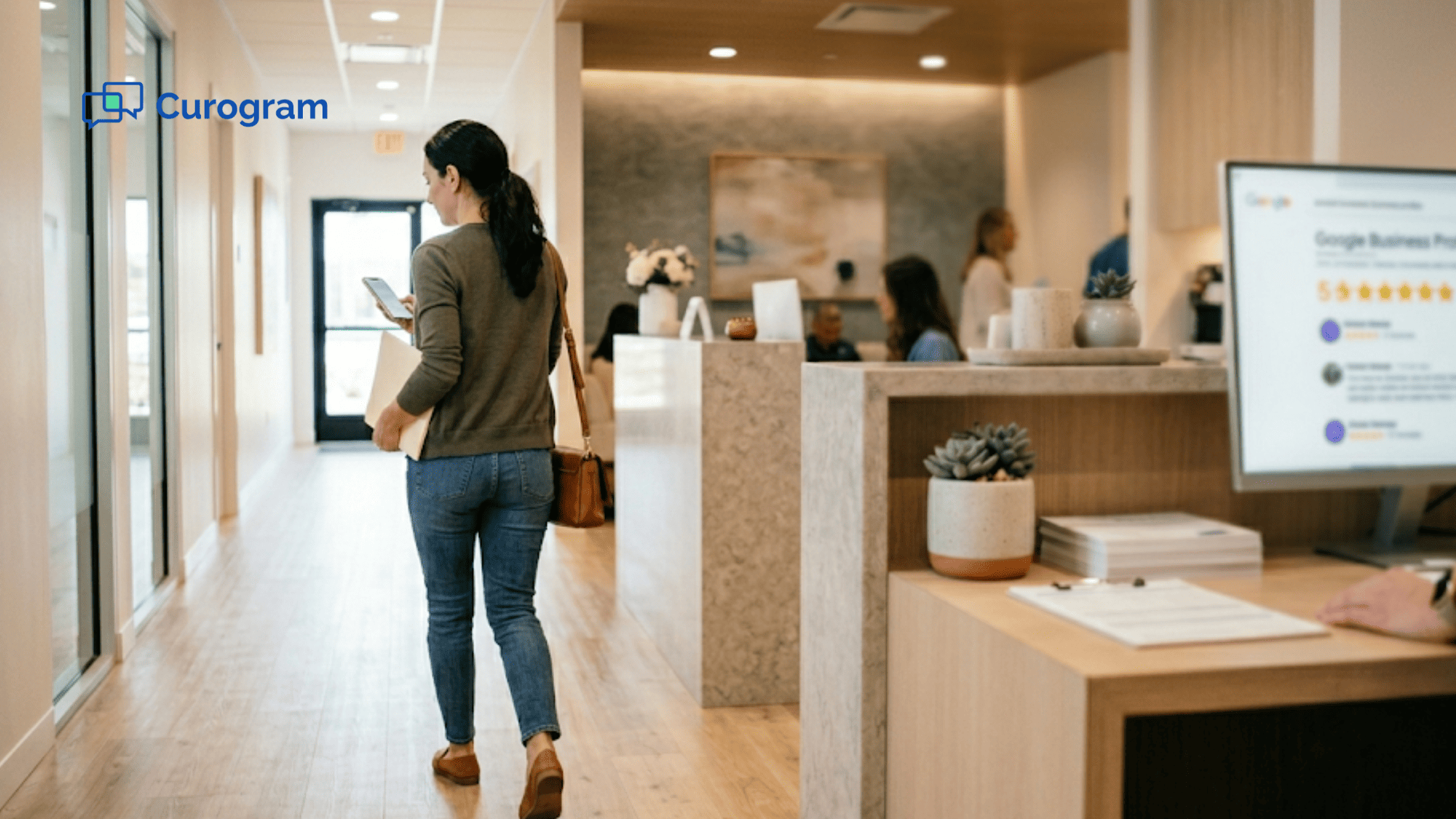 Patient walking away from medical office front desk while checking phone after a positive visit