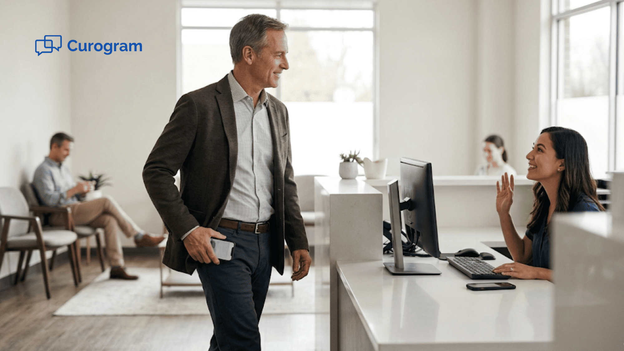 Patient walking past a front desk at a modern medical practice with no clipboards while staff greets him with a smile