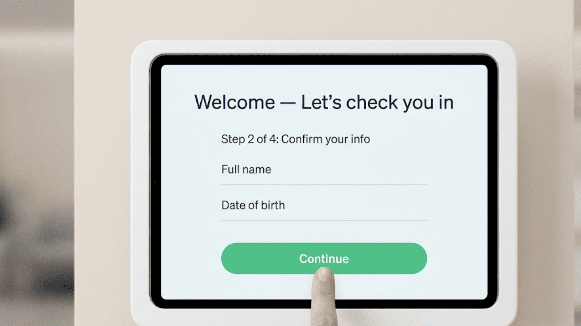 Self-check-in tablet screen showing a patient confirming their info during check-in