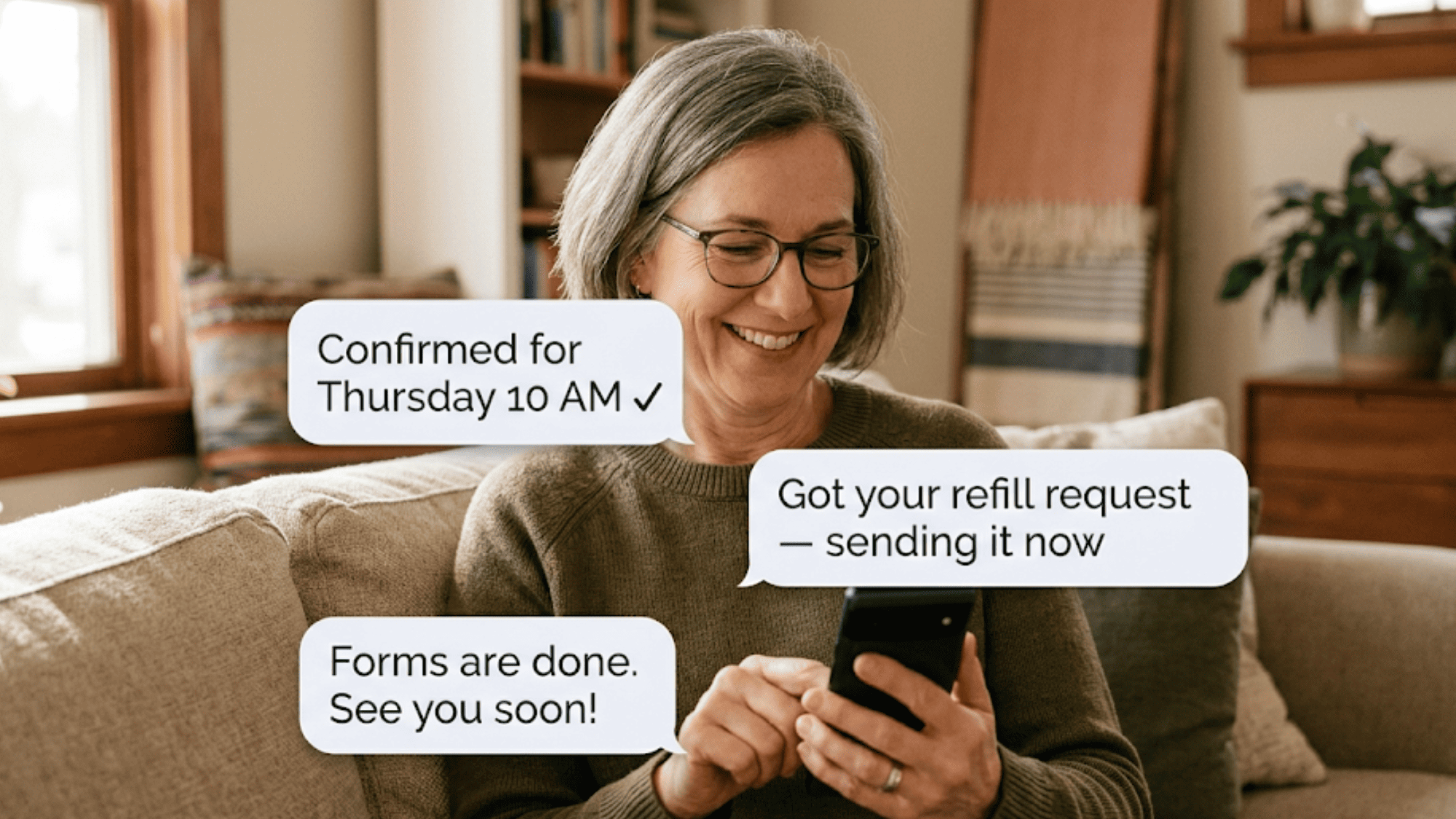 Woman smiling at her phone while receiving SMS confirmations from her medical practice using Curogram two-way texting for Elation Health