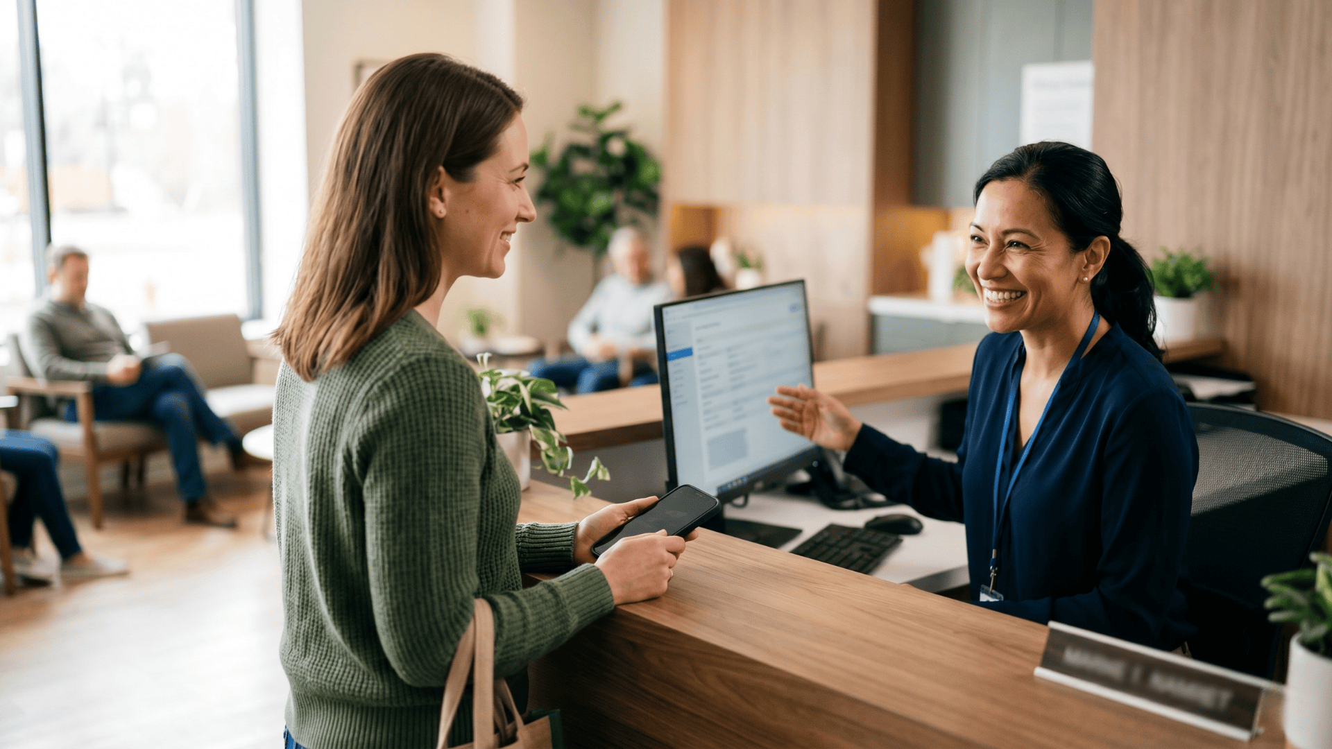 Patient checking in at medical practice after completing Veradigm digital intake forms via text link
