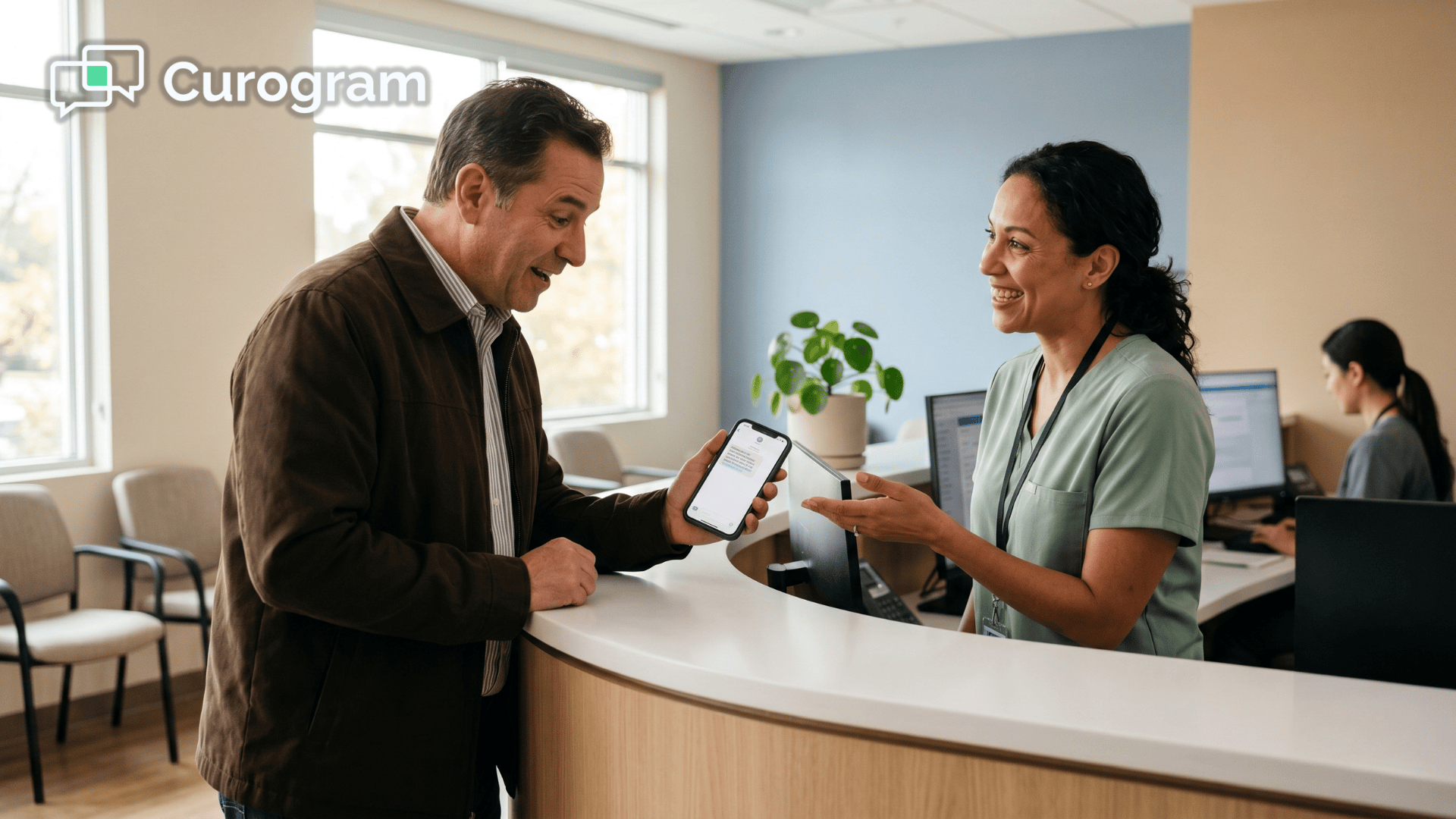 Medical front desk staff helping a patient join a Veradigm EHR telemedicine visit via SMS link.