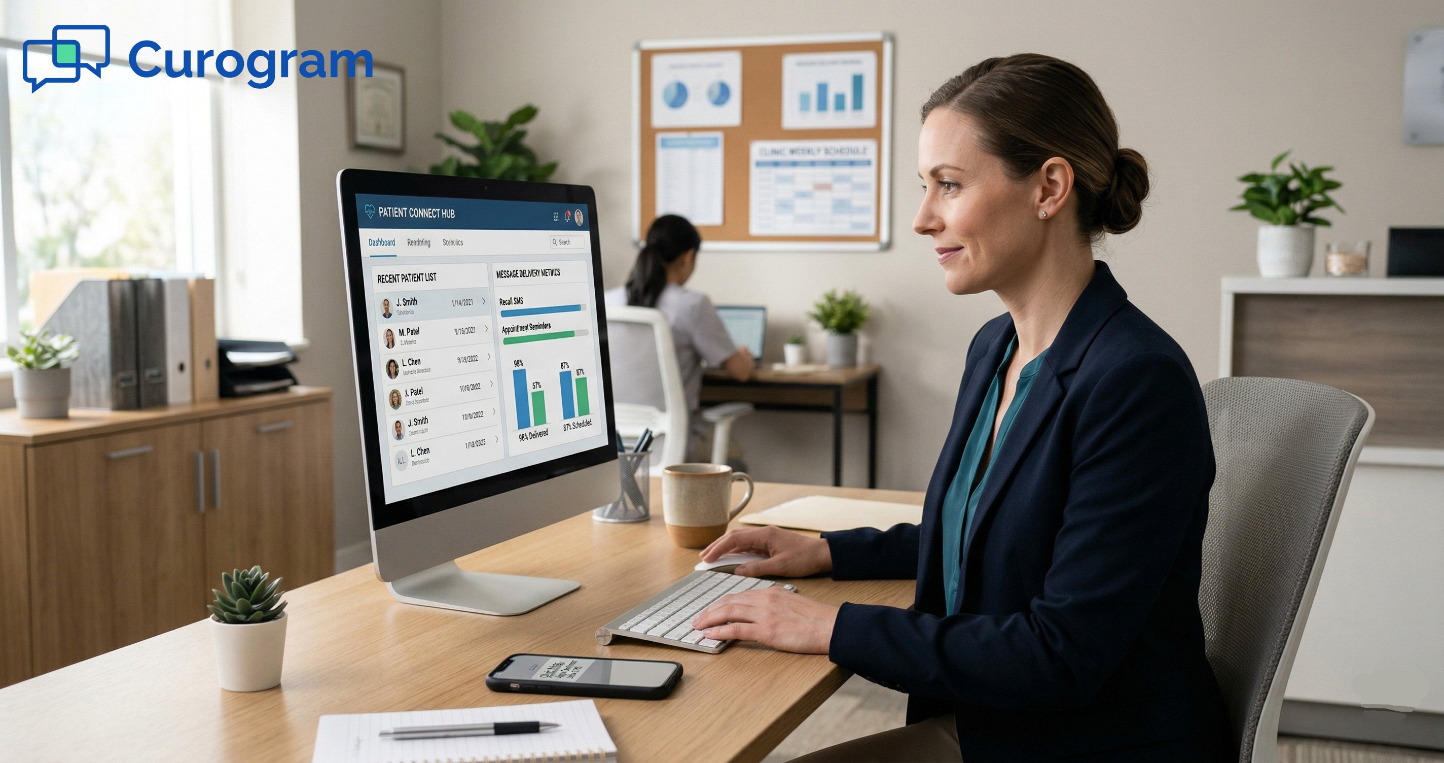 Medical office manager working at a desk using patient scheduling software