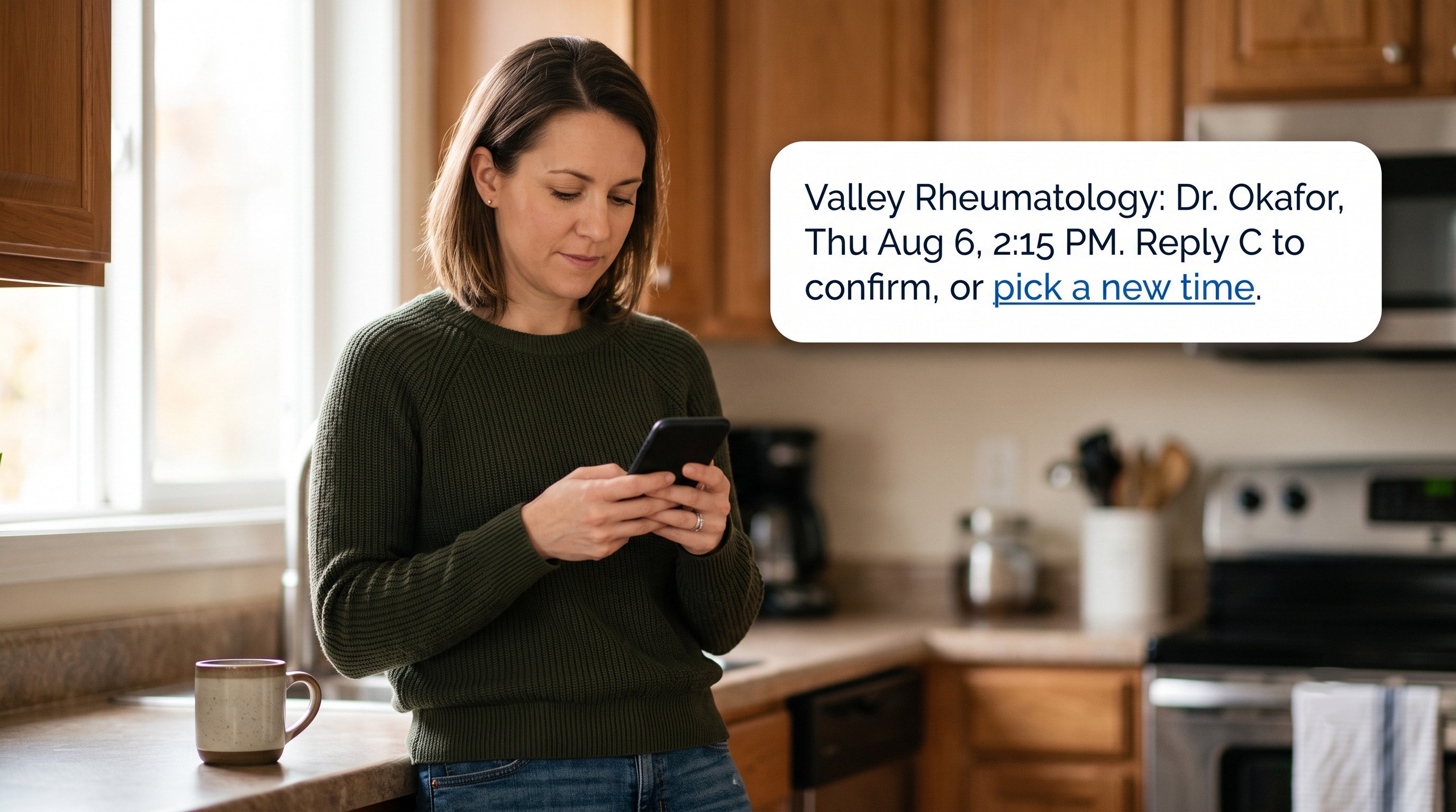 Patient reviewing an SMS appointment reminder text with a reschedule link