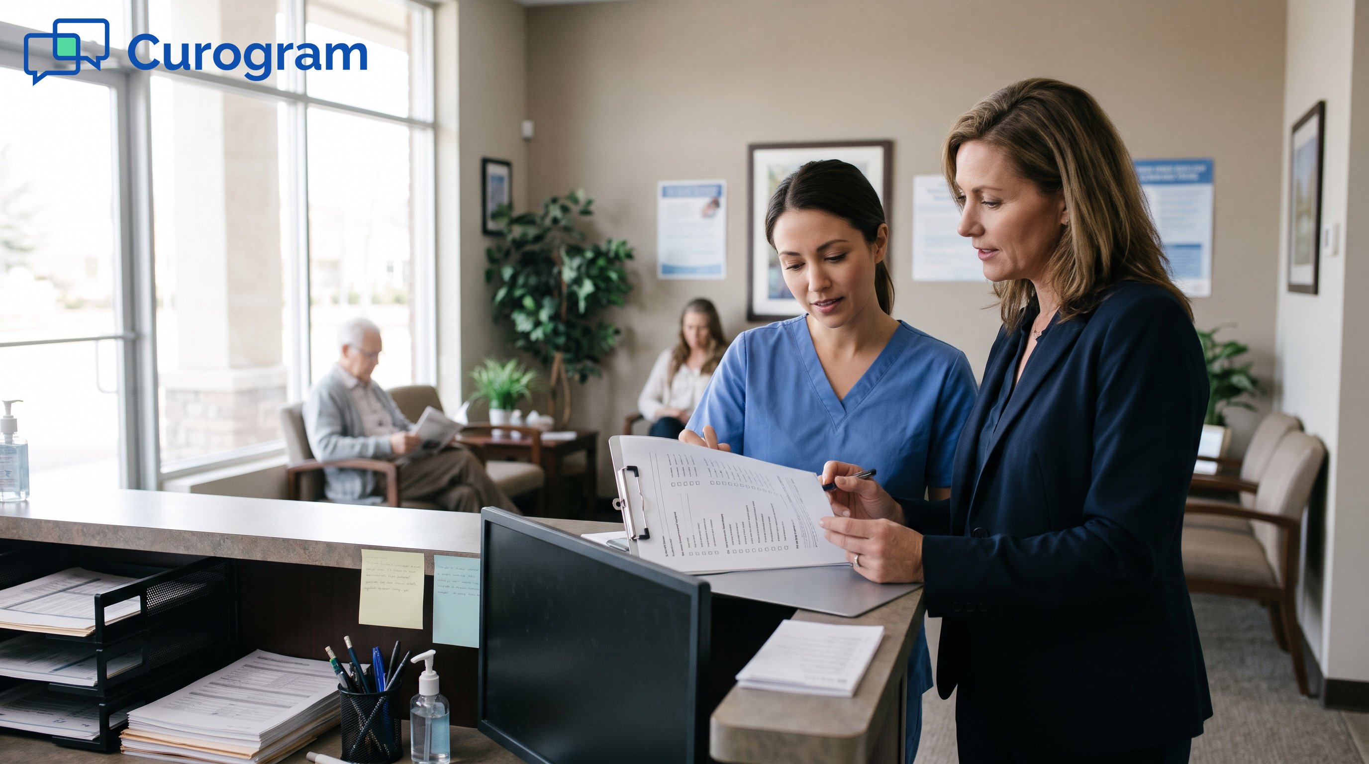 A practice administrator and a front desk worker review a go-live checklist