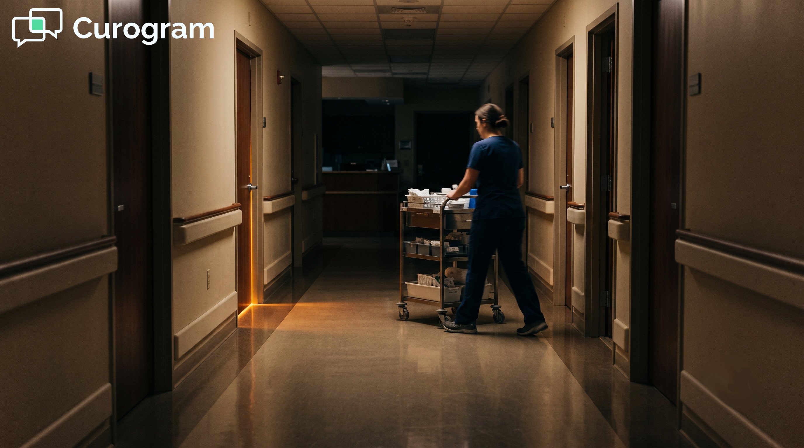 Dimly lit, empty hospital hallway at night, illustrating the patient discharge setting