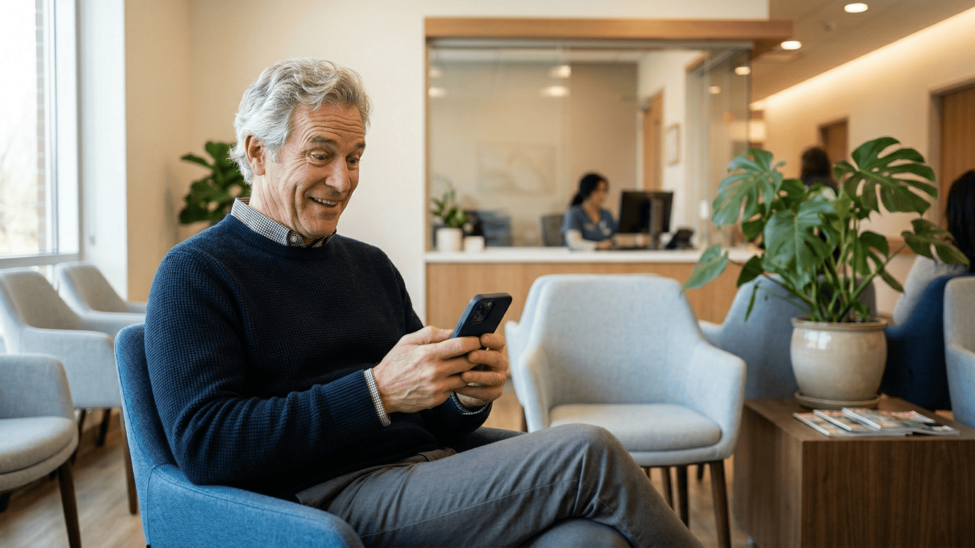 Patient reading automated review request SMS in imaging center waiting room