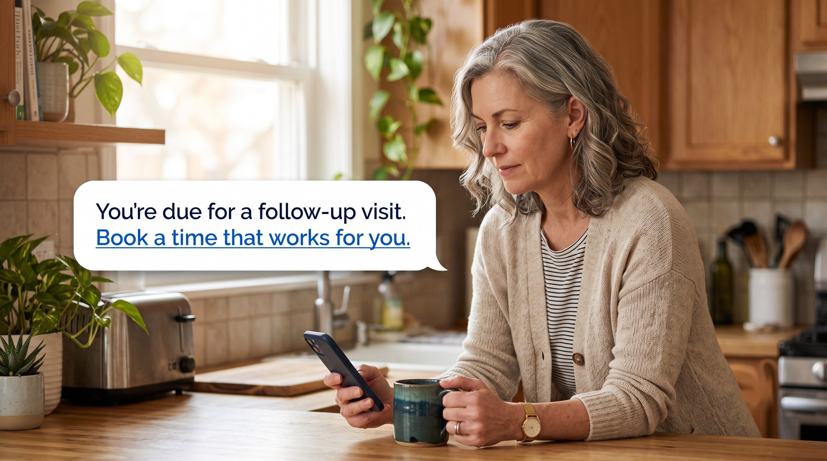 Patient reading a text reminder to book a follow-up medical appointment