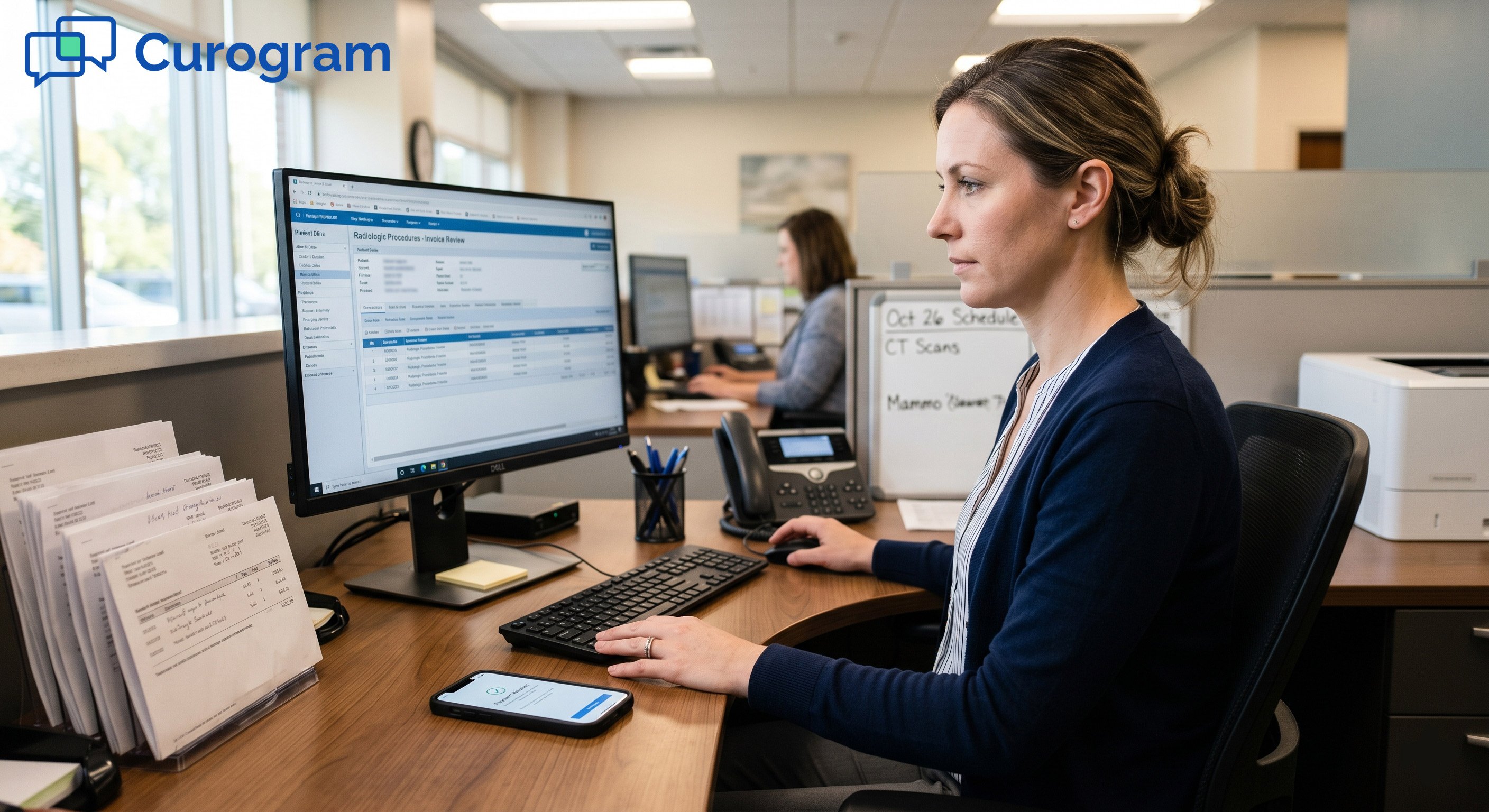 A medical officer looking at the computer with financial statements