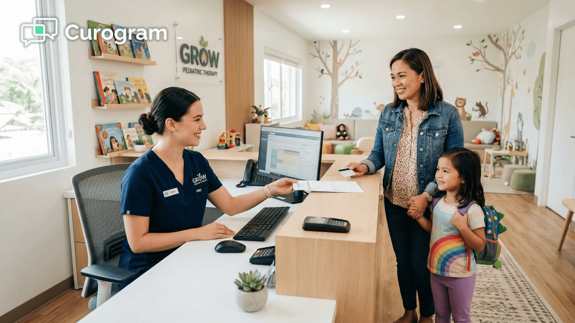 Front desk staff welcoming a parent and child at a pediatric therapy clinic