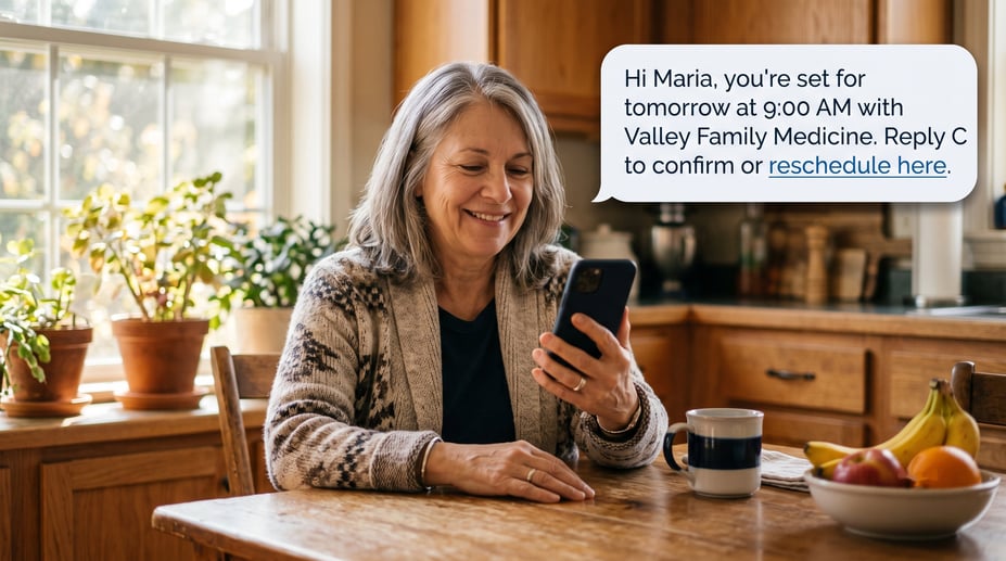 Patient viewing an automated medical appointment text reminder on her smartphone