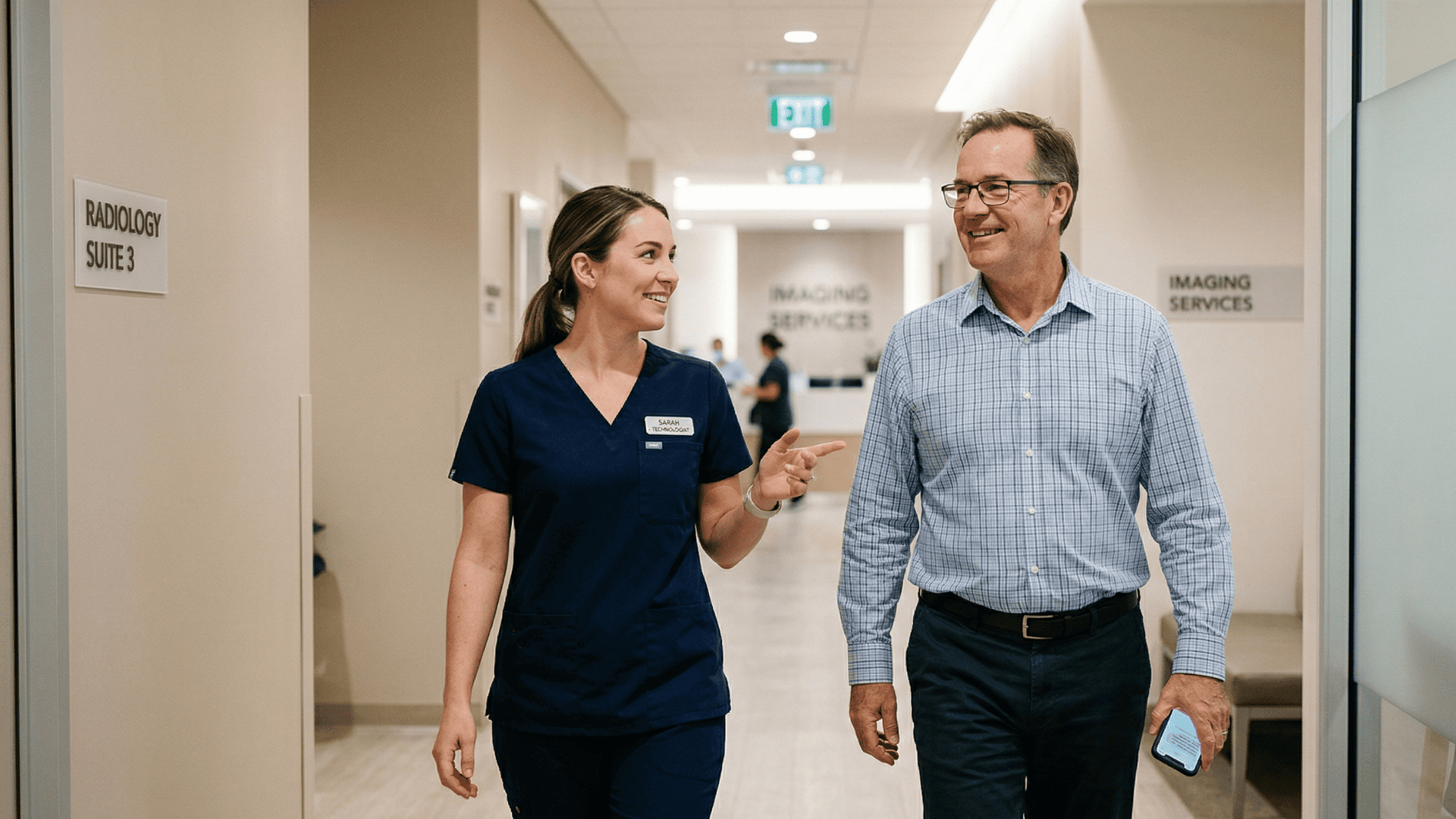 Radiology technologist walking patient out after a positive imaging experience