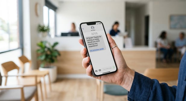 Close-up: Patient receiving a dental review request via direct text link