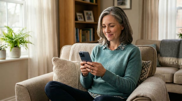 Patient smiling while using a mobile telemedicine link for a stress-free virtual visit