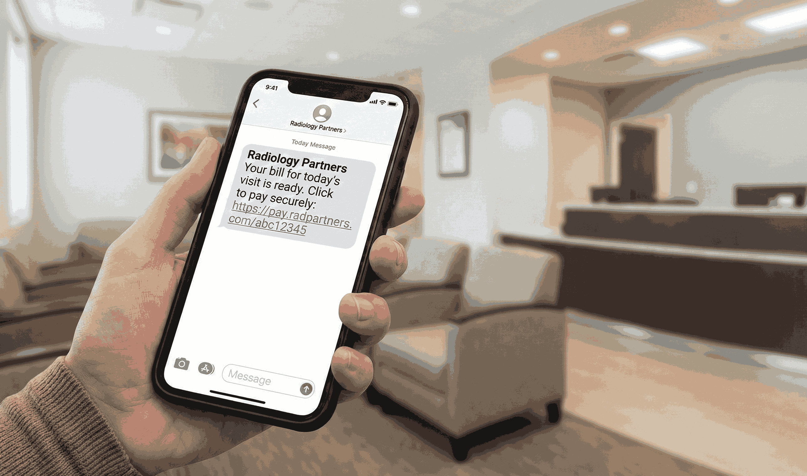Smartphone shows text-to-pay link from Radiology Partners.